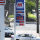 Gas prices at a two stations in Bethesda, Maryland on August 11.